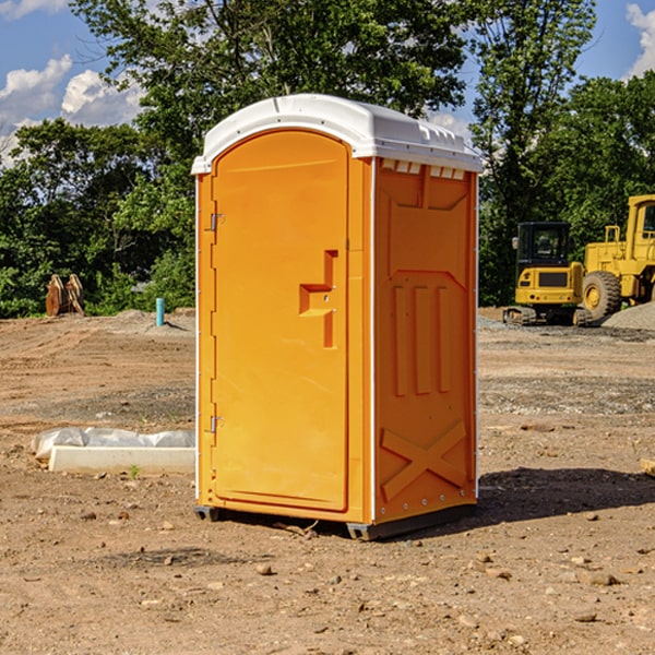 how often are the porta potties cleaned and serviced during a rental period in Woodburn